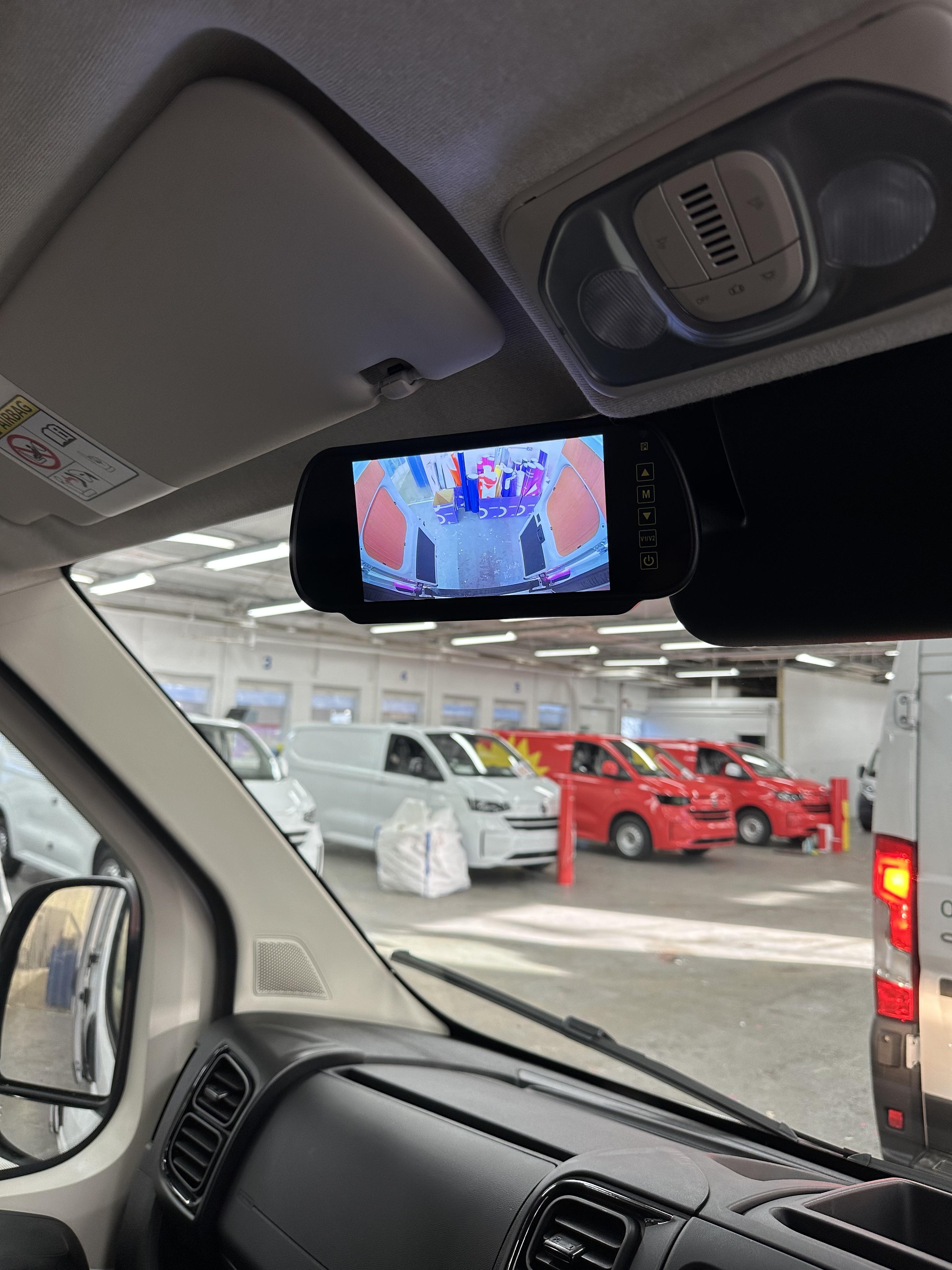 Reverse camera monitor mounted on windscreen