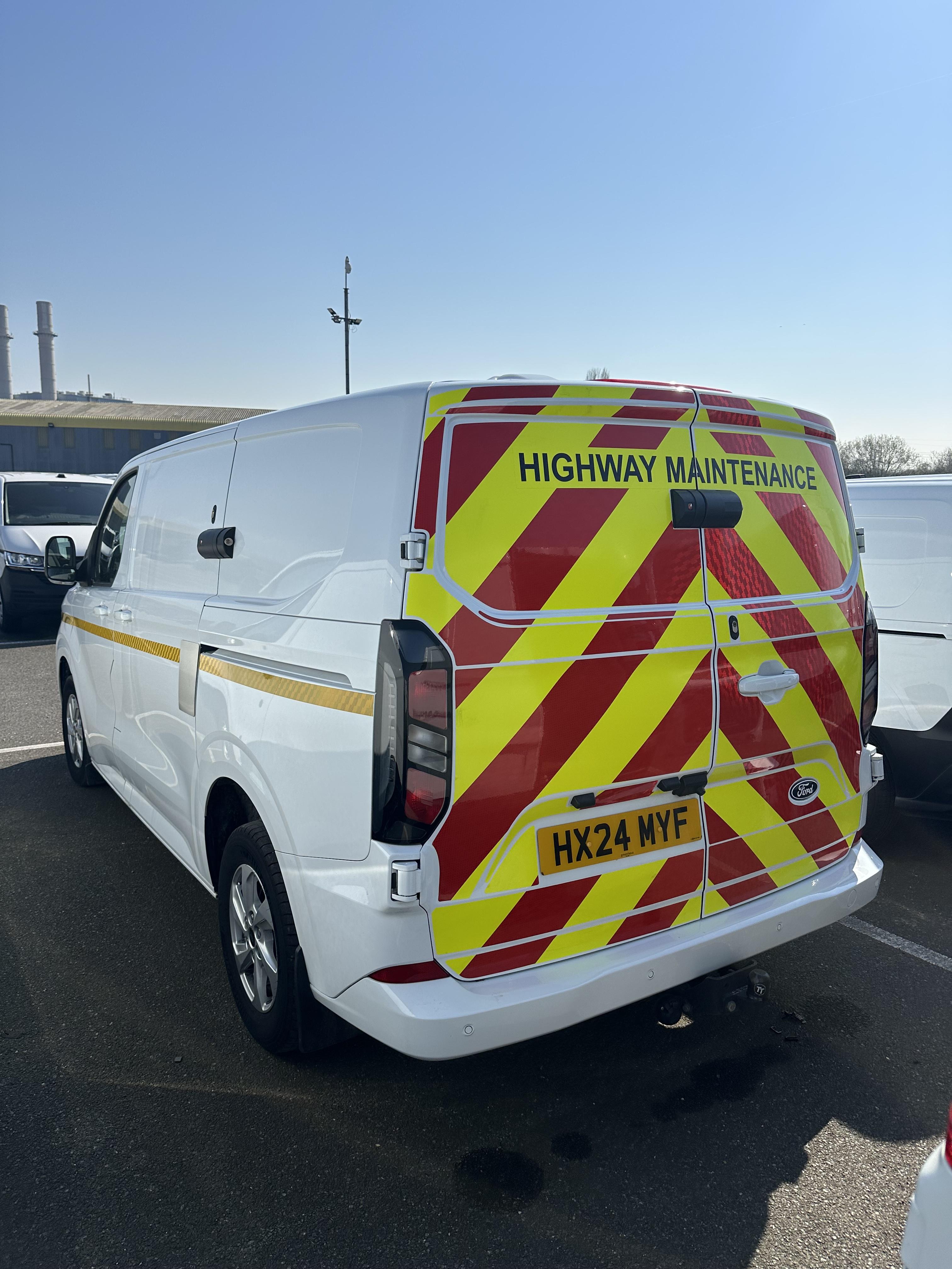 Full Chapter 8 highway maintenance chevrons on van
