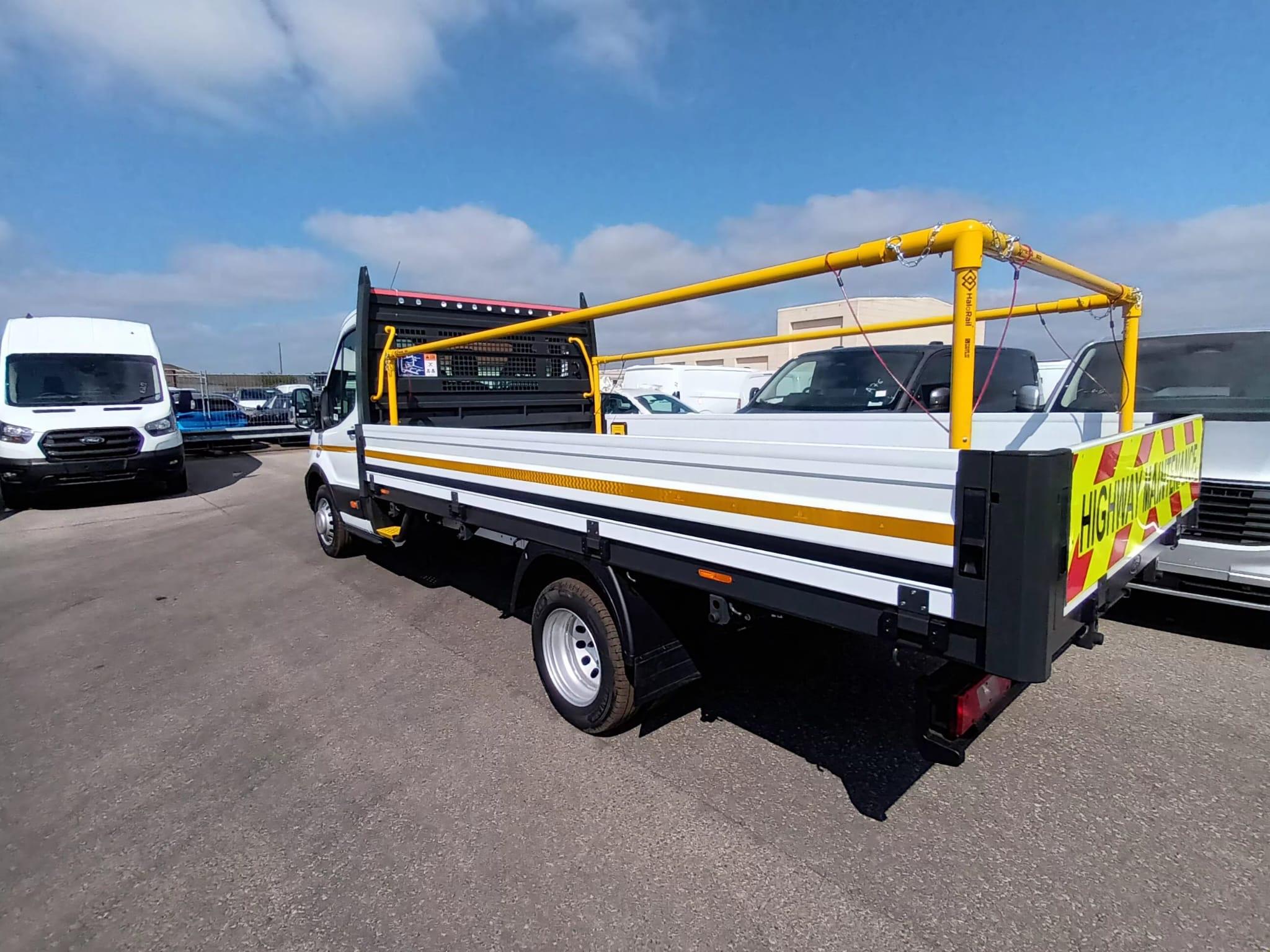 Flatbed truck with Chapter 8 chevrons and safety frame
