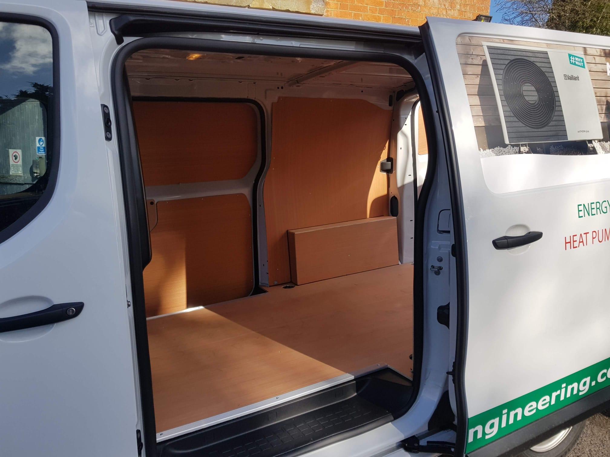 Ply lining in branded engineering company van through side door