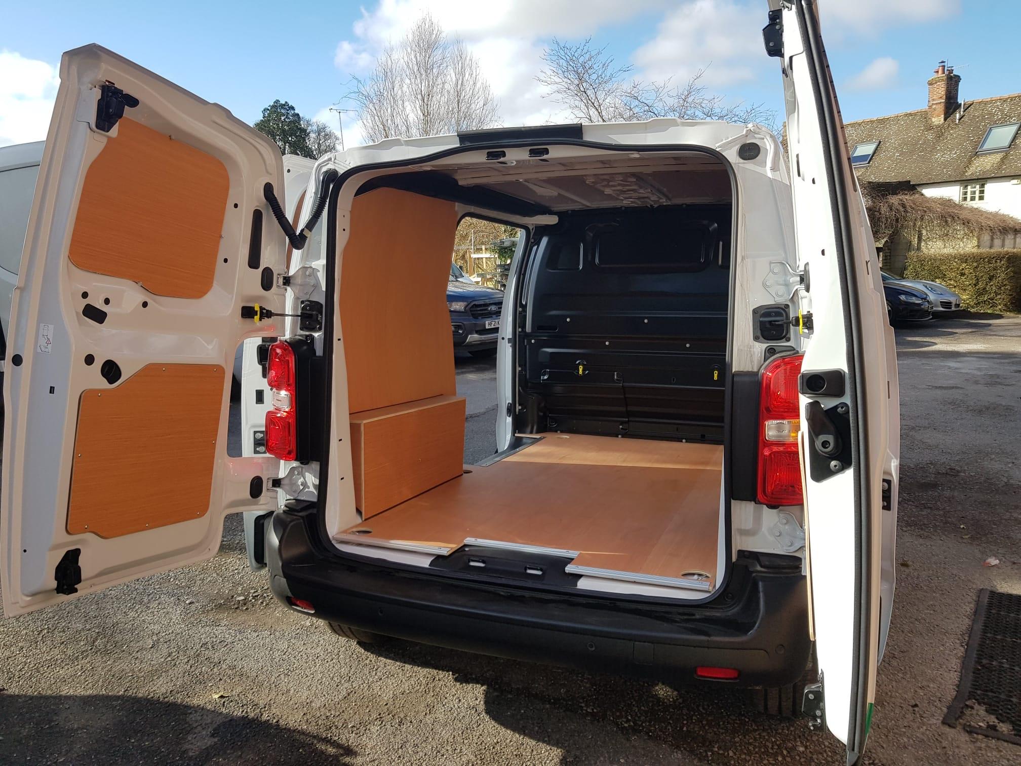 Complete ply lining with floor walls and doors in medium van
