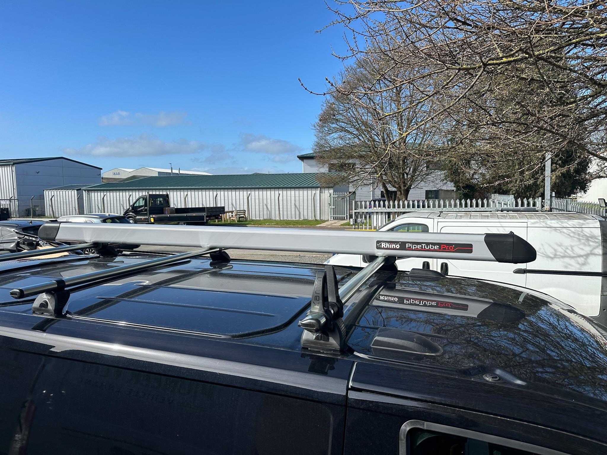 Rhino PipeTube system with roof bars on van